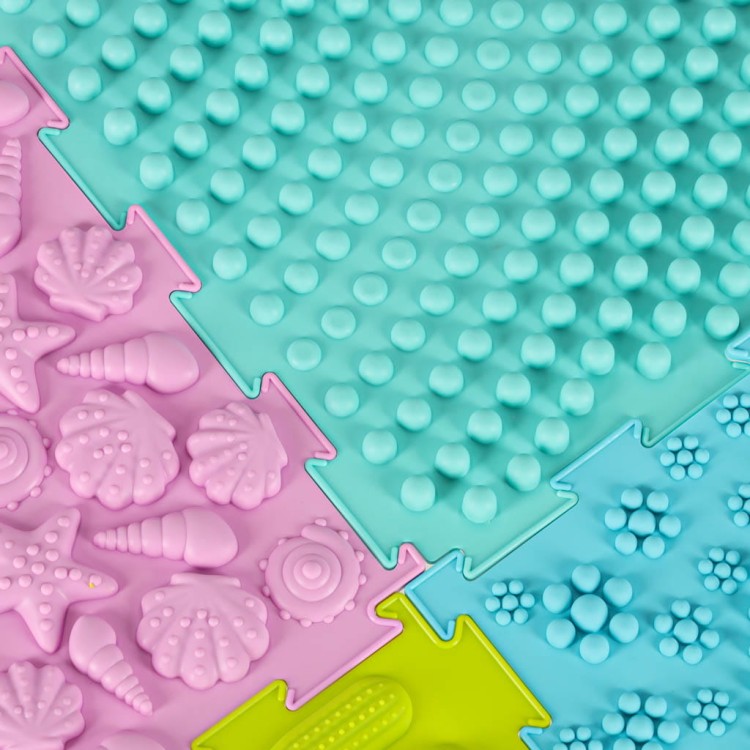 Mata-sensoryczna-puzzle-montessori-do-masazu-stop-8-elementow-pastelowe-172130.jpg