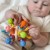 woopie-baby-miekka-grzechotka-2w1-gryzak-zabawka-sensoryczna-dla-niemowlat-0m (1).jpg